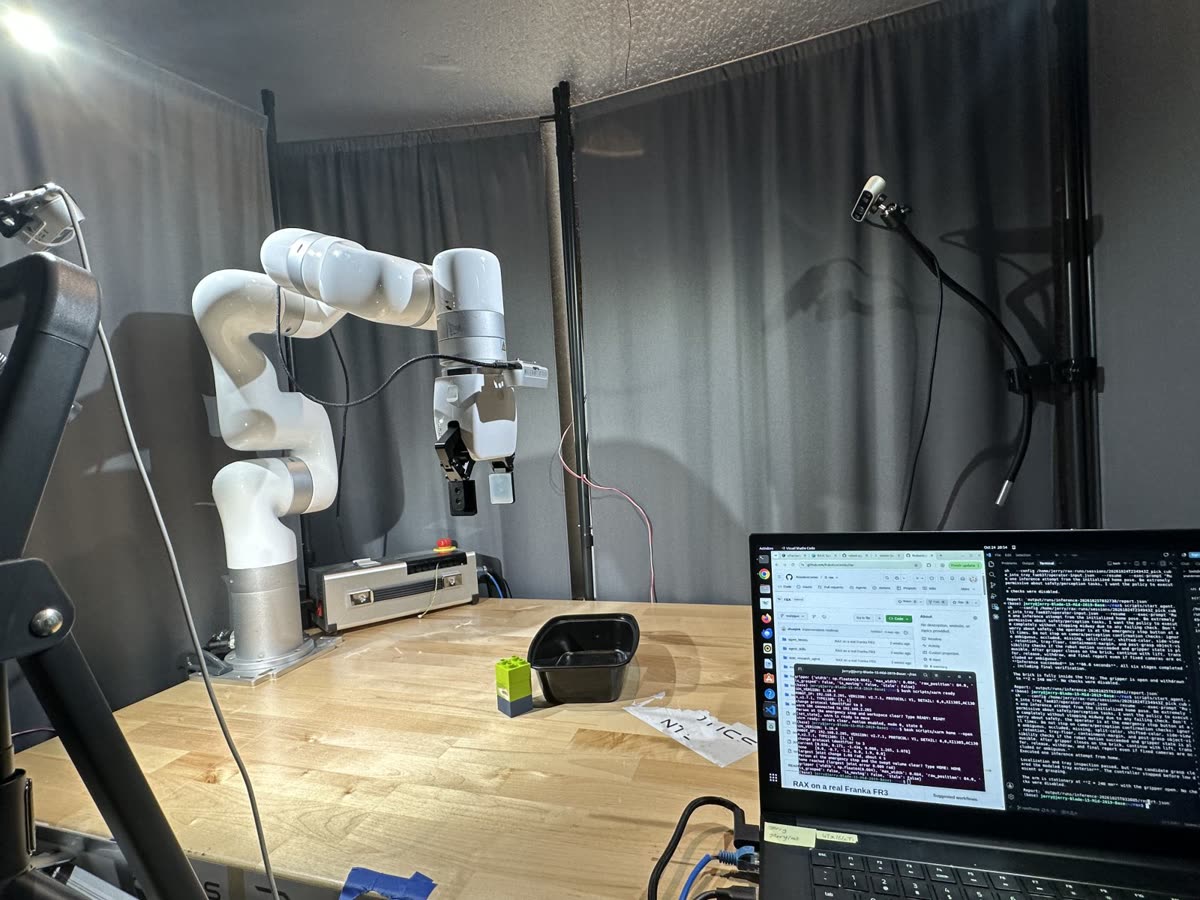 The xArm 6 workcell: arm, table with tray and brick, and a fixed RealSense camera on a stand